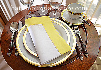 White Hemstitch Dinner Napkin with Aurora Yellow borde